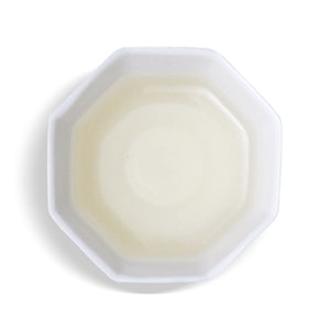 overhead view of white cup with Biluochun Green tea inside