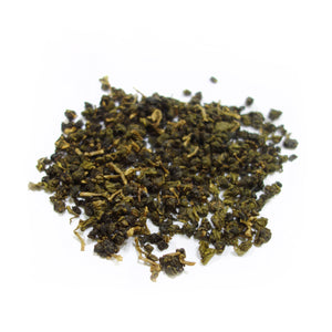 Lishan High Mountain Oolong whole tea leaves on white surface