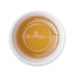 overhead view of white cup with Oriental Beauty tea inside