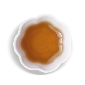 overhead view of white cup with Sun Moon Lake Red Rhyme tea inside