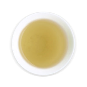 overhead view of white cup with Wenshan Baozhong tea inside